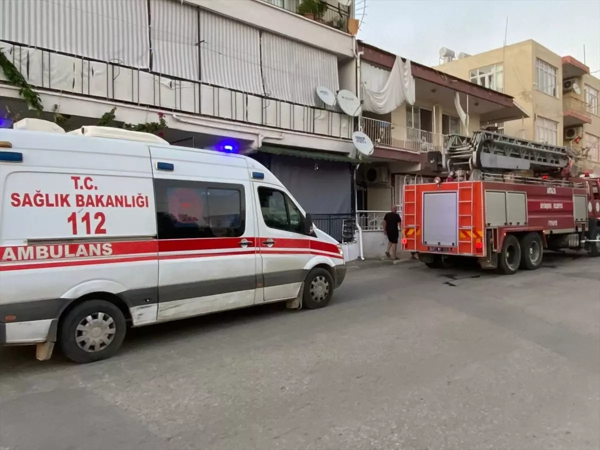 antalyada yangin cikan evde kus kurtarildi 1B2HAniq.jpg